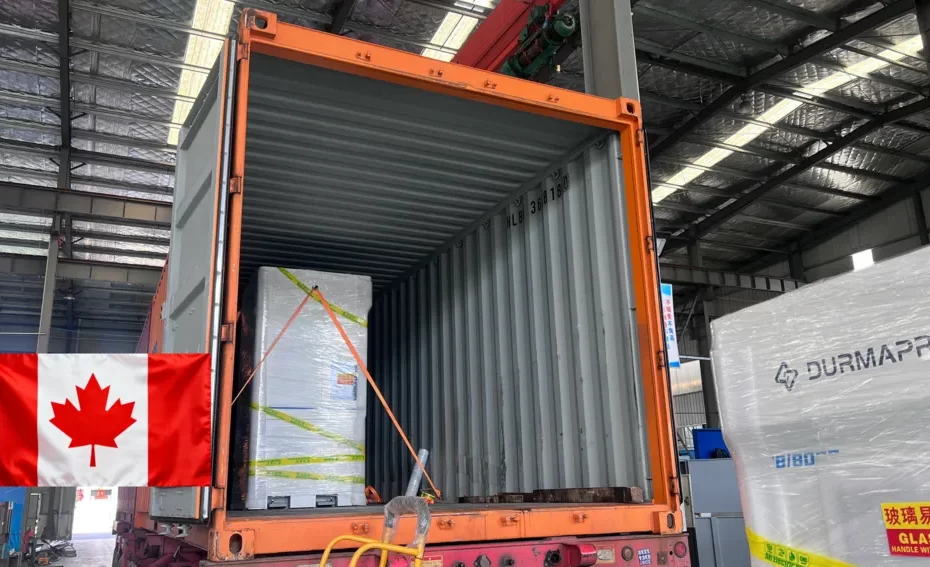 Machinery being loaded onto trucks bound for Canada