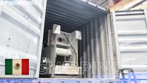 Industrial punch press packed in wooden crate for machinery export