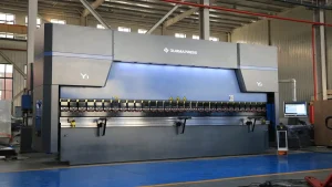 CNC press brake forming sheet metal in a manufacturing workshop