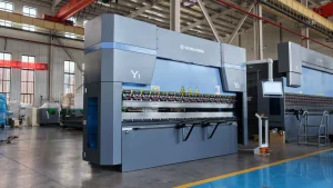 CNC press brake forming sheet metal to controlled dimensional tolerances