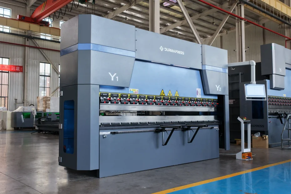 CNC press brake forming sheet metal to controlled dimensional tolerances