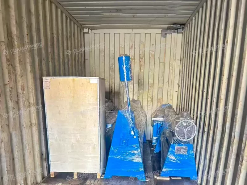 Multiple industrial machines loaded into container for export